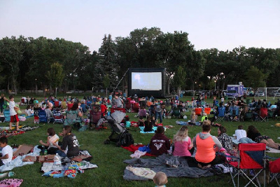 Photograph of movie goers in Mills Park