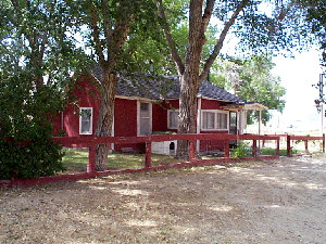 Photograph of little red ranch house at Silver Saddle Ranch.